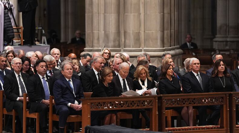 Former Presidents front row from left, George W. Bush with Laura Bush, Joe Biden with Jill Biden and former Vice Presidents Kamala Harris and Mike Pence with Karen Pence, front right, and other invited guests, are seated during the funeral for former Vice President Dick Cheney at the Washington National Cathedral on Thursday, Nov. 20, 2025 in Washington. (AP Photo/Matt Rourke)