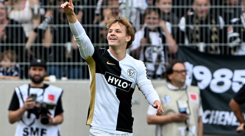 Elversberg's Cole Campbell celebrates after scoring during a Bundesliga soccer match between Elversberg and Bayer Leverkusen, in Spiesen-Elversberg, Germany, Saturday, Aug. 29, 2026. (Harald Tittel/dpa via AP)