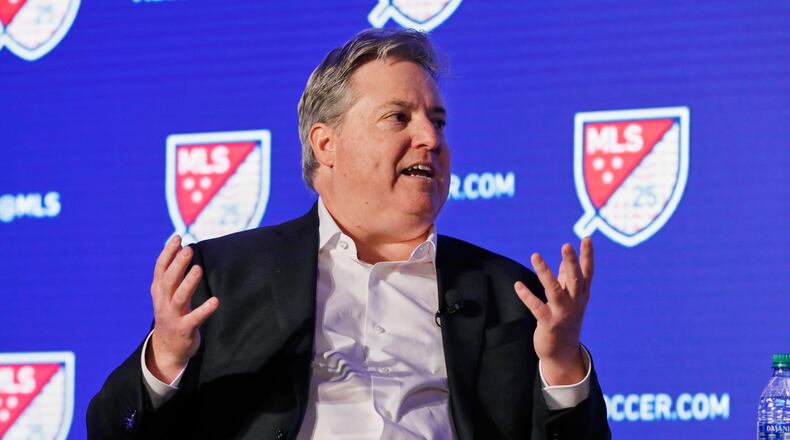 FILE - Los Angeles FC lead owner Larry Berg gestures during an interviewed at the Major League Soccer 25th Season kickoff event in New York, Feb. 26, 2020. (AP Photo/Richard Drew, File)
