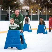 Kids and adults can skate to holiday music and warm up with hot cocoa during one-hour sessions at the second Skate City Springs at Sandy Springs' City Green. Courtesy of Thomas Swofford/City of Sandy Springs