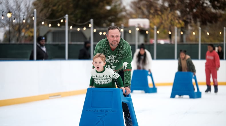 Kids and adults can skate to holiday music and warm up with hot cocoa during one-hour sessions at the second Skate City Springs at Sandy Springs' City Green. Courtesy of Thomas Swofford/City of Sandy Springs