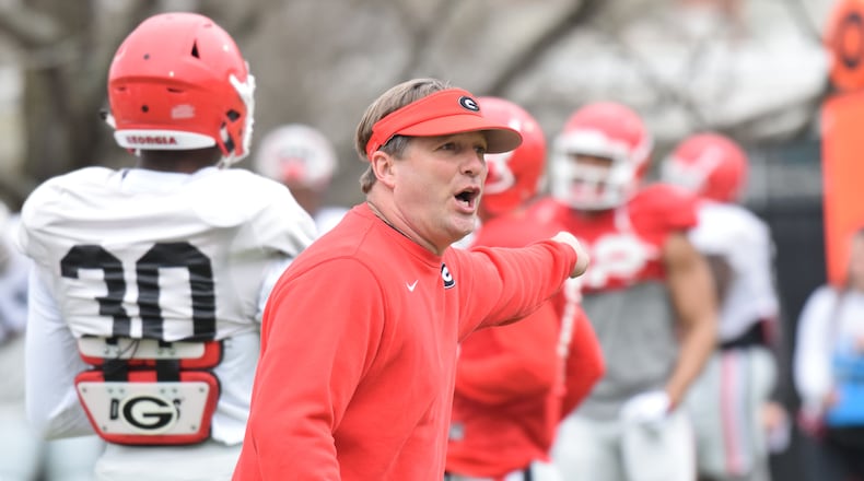 Georgia head coach Kirby Smart directs players during a Bulldogs' practice on the Woodruff Practice Fields in Athens.