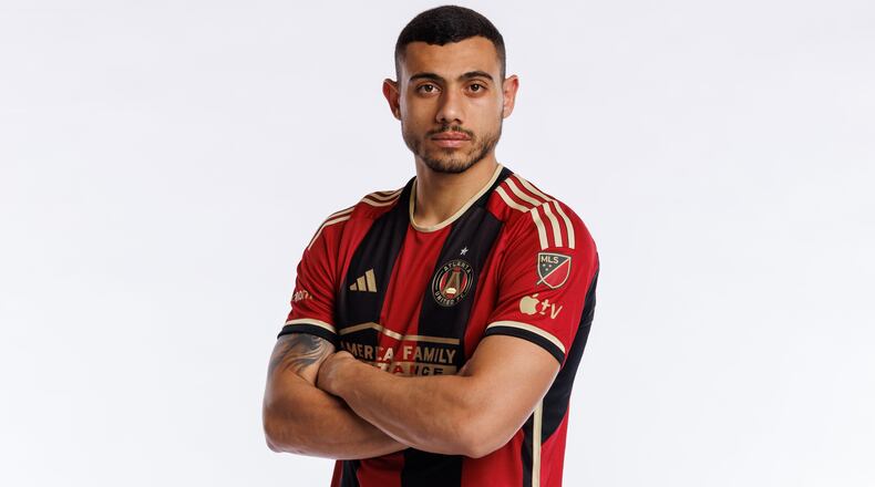 Atlanta United forward Giorgos Giakoumakis models the team's new kit. (Photo by Karl L. Moore/Atlanta United)