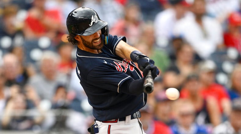 Atlanta Braves' Dansby Swanson in action during a baseball game against the Washington Nationals, Saturday, July 16, 2022, in Washington. (AP Photo/Nick Wass)