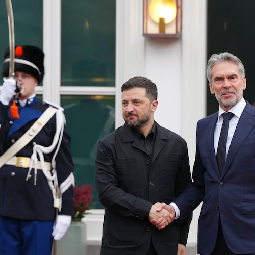 Dutch Prime Minister Dick Schoof, right, welcomes Ukraine's President Volodymyr Zelenskyy in The Hague, Netherlands, Tuesday, Dec. 16, 2025. (AP Photo/Peter Dejong)