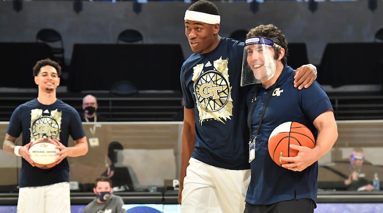 February 27, 2021 Atlanta - Georgia Tech's forward Moses Wright and Georgia Tech's head coach Josh Pastner smile before their game against Syracuse during a NCAA college basketball game at Georgia Tech's McCamish Pavilion in Atlanta on Saturday, February 27, 2021. (Hyosub Shin / Hyosub.Shin@ajc.com)