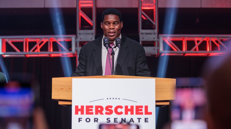 Herschel Walker speaks at his Senate runoff election night party at the College Football Hall of Fame in Atlanta on Tuesday, December 6, 2022. Walker lost against Democratic U.S. Sen. Raphael Warnock. (Arvin Temkar / arvin.temkar@ajc.com)