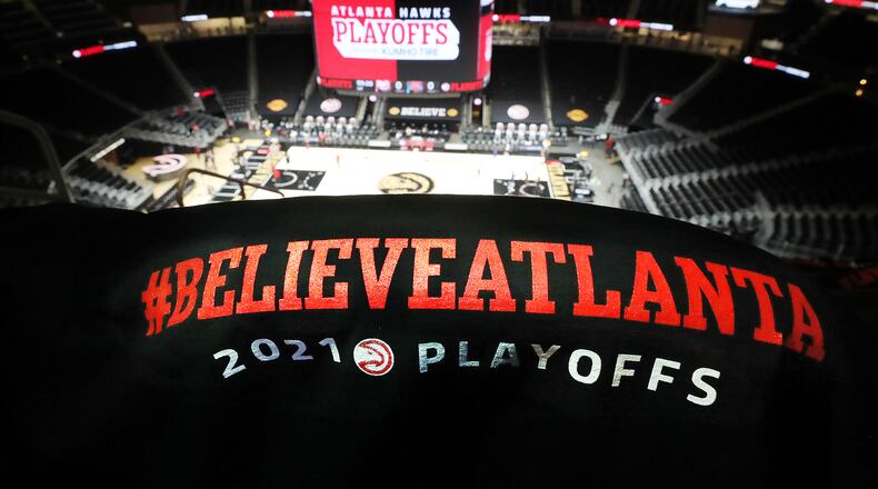 Handout shirts #BELIEVEATLANTA cover the seats for fans in State Farm Arena for fourth playoff game between the Hawks and New York Knicks Sunday, May 30, 2021, in Atlanta. (Curtis Compton / Curtis.Compton@ajc.com)