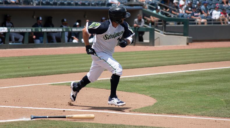 Gwinnett Stripers third baseman Sean Kazmar runs to first base on a hit Sunday, July 11, 2021, against the Nashville Sounds in Lawrenceville. (Patricia Ortiz/Gwinnett Stripers)