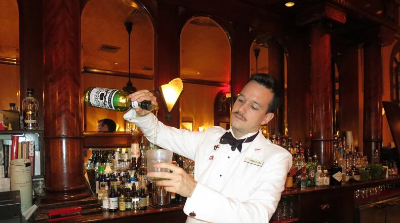 Bartender Christoph Dornemann mixes a Sazerac at the French 75 Bar in New Orleans. Contributed by Wesley K.H. Teo
