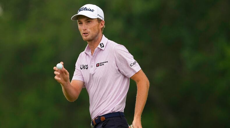 Will Zalatoris waves after making a putt on the eighth hole during the second round of the PGA Championship golf tournament at Southern Hills Country Club, Friday, May 20, 2022, in Tulsa, Okla. (AP Photo/Matt York)