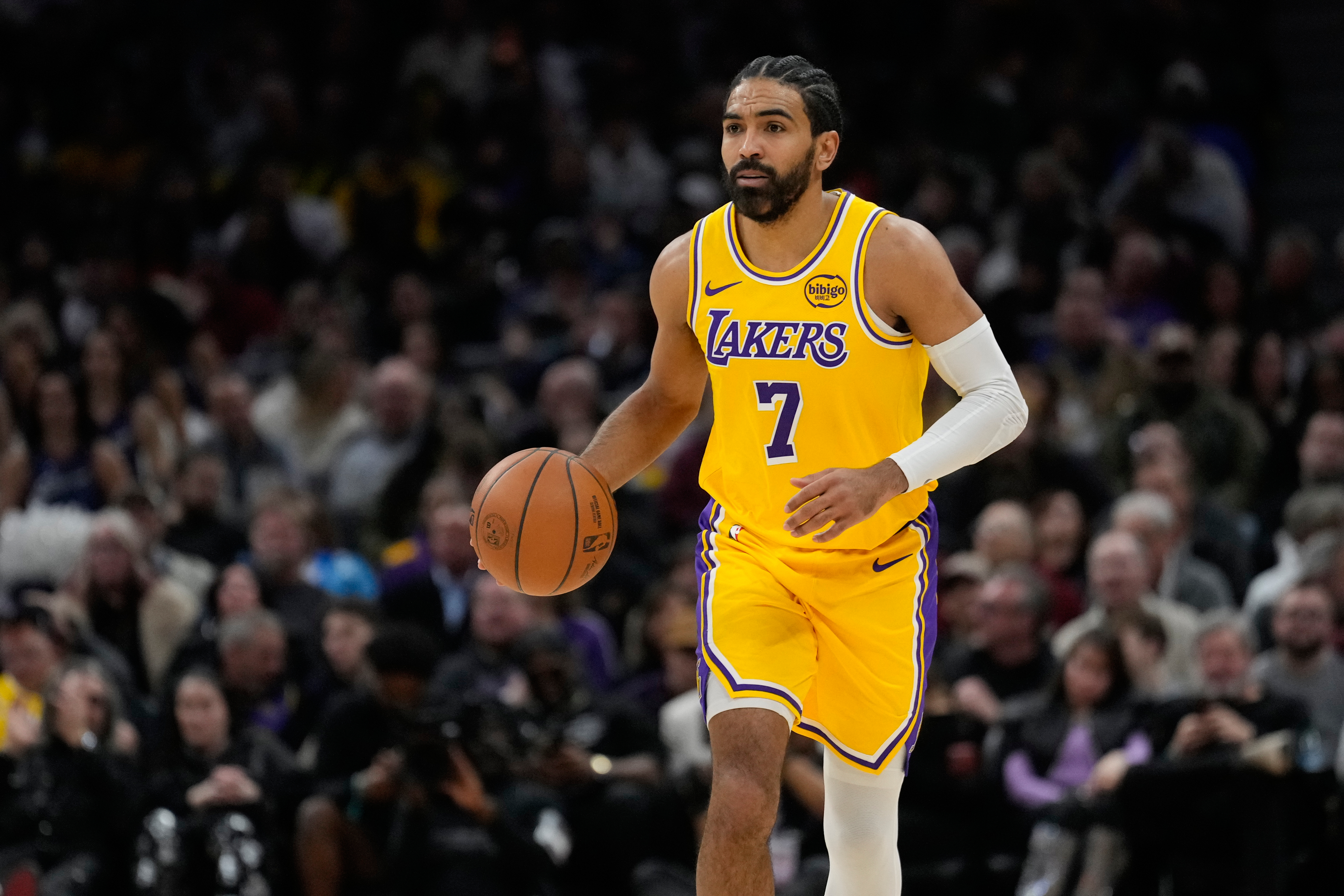 Gabe Vincent comes to the Hawks from the Lakers in a trade for guard Luke Kennard. (Sue Ogrocki/AP)