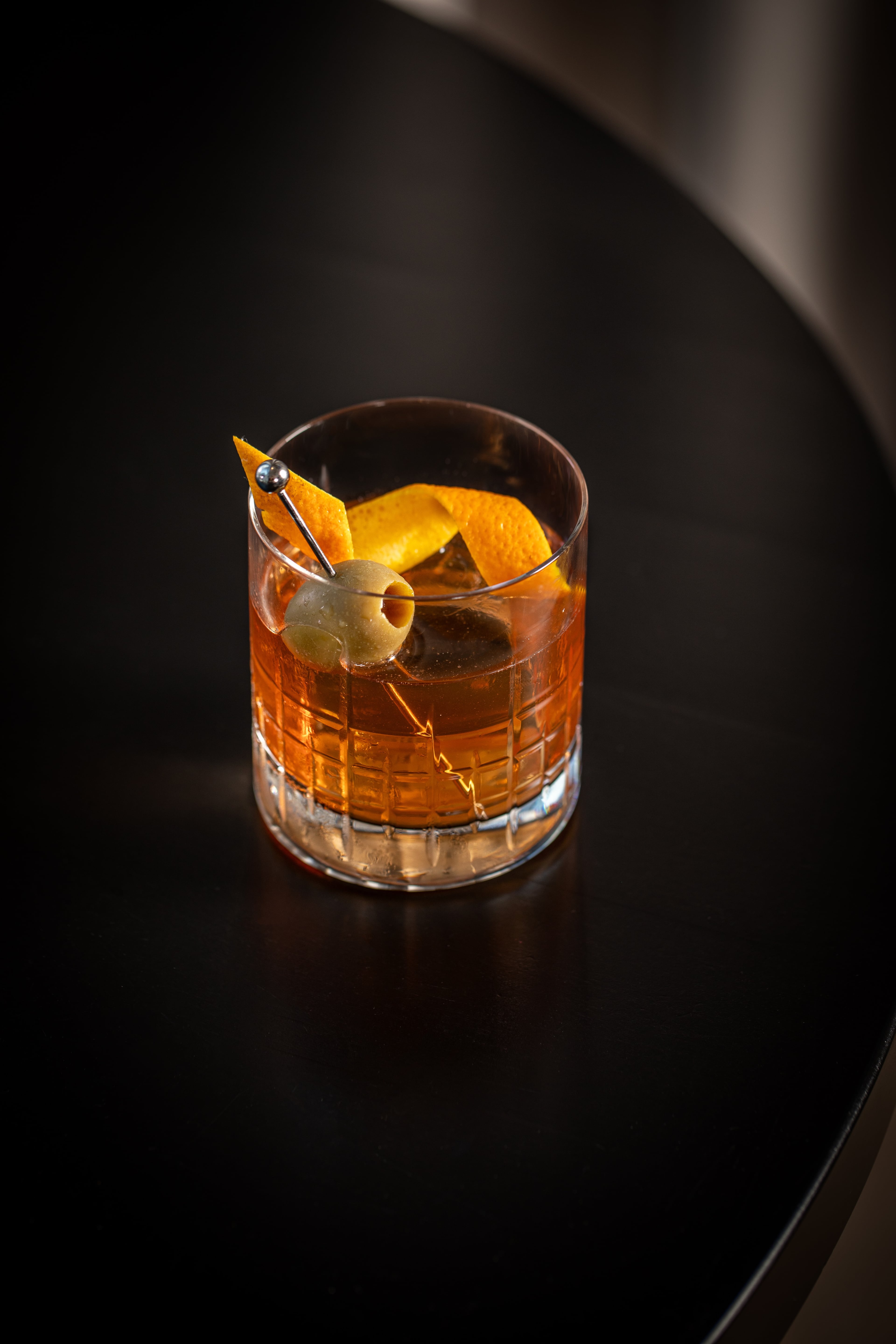Capolinea's Hogwash Old Fashioned blends lardo-infused Four Roses bourbon with local Murrell's Row Eno amaro, Demerara sugar and dashes of orange bitters. (Courtesy of Bites and Bevs Media)