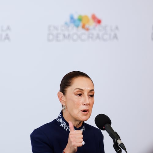 Mexican President Claudia Sheinbaum addresses the media at the Meeting in Defence of Democracy summit, in Barcelona, Spain, Saturday, April 18, 2026. (AP Photo/Joan Monfort)