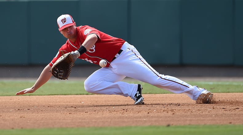 The Braves traded for Nationals first baseman/corner outfielder Tyler Moore, who made a big splash as a rookie in 2012 but had struggled since then and was outrighted to Triple-A after going unclaimed on waivers. (AP photo)