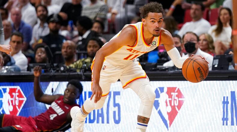 Hawks guard Trae Young and his teammates are scheduled to travel to Abu Dhabi during the preseason. (AP Photo/Wilfredo Lee)