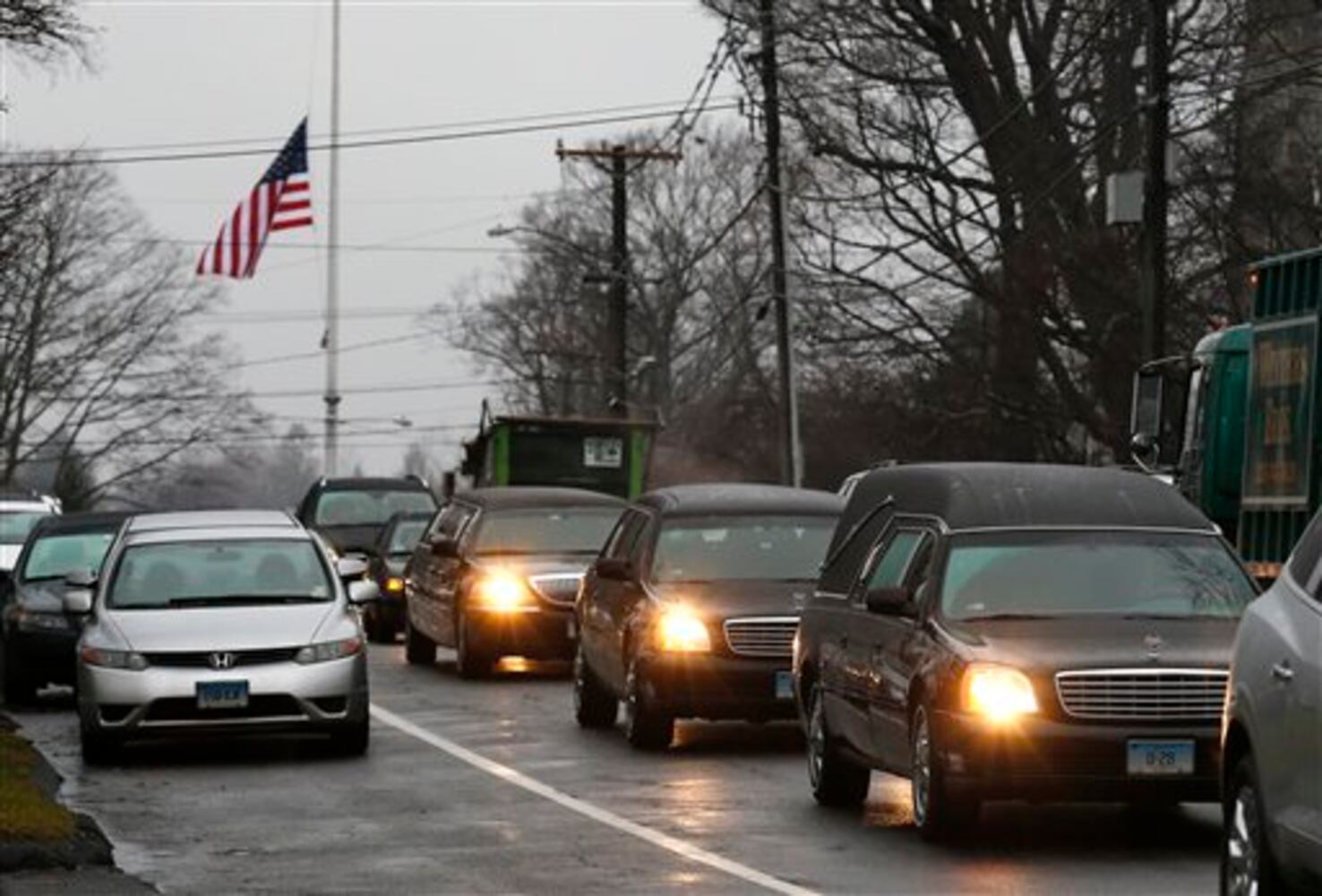 Newtown holds the first funerals for the victims