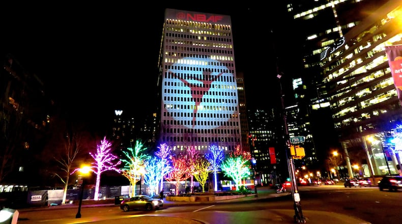 The National Black Arts Festival is getting into the swing of Super Bowl week with digital projections on Midtown buildings that highlight the connection between sports and the arts. CONTRIBUTED: NBAF