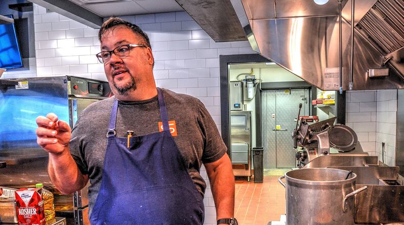 Chef Scott Serpas’ menu at Dixie Q is mostly standards — brisket, pulled pork, house-made sausage — with just a few touches to hint that an upscale-dining chef is involved. (Chris Hunt/special)