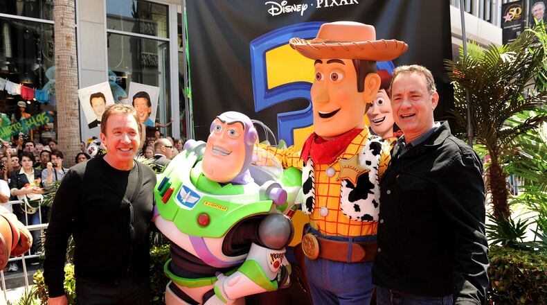 HOLLYWOOD - JUNE 13: Actors Tim Allen and Tom Hanks arrives at premiere of Walt Disney Pictures' "Toy Story 3" held at El Capitan Theatre on June 13, 2010 in Hollywood, California. (Photo by Kevin Winter/Getty Images)