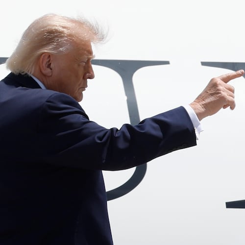 President Donald Trump gestures from the stairs of Air Force One upon his arrival at Joint Base Andrews, Md., Friday, June 5, 2026.(AP Photo/Luis M. Alvarez)