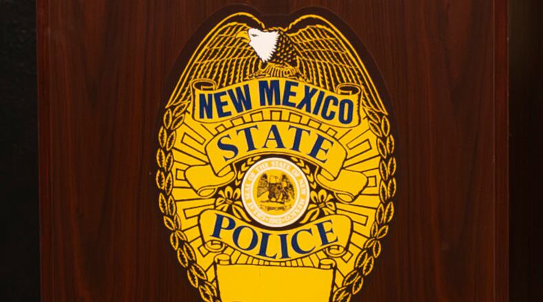 FILE - A New Mexico State Police emblem is displayed on podium during a news conference, March 16, 2024, in Albuquerque, N.M. (Jon Austria/The Albuquerque Journal via AP, File)