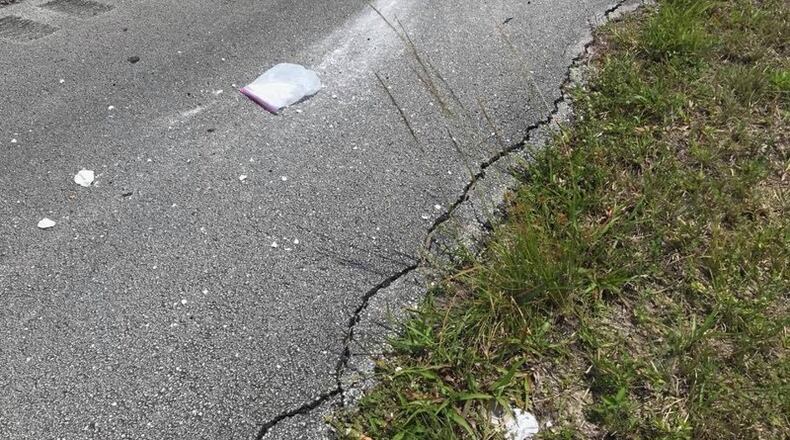 Deputies said a man tossed drugs out of his car window after he was pulled over.