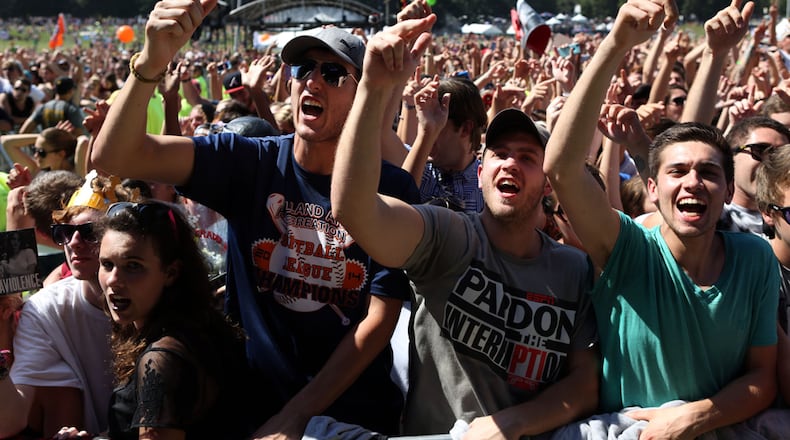 MUSIC MIDTOWN--Sept 20, 2014 - ATLANTA - Fans of Vic Mensa are pumped up by his performance on Day 2 of Music Midtown at Piedmont Park on Saturday. (Akili-Casundria Ramsess/Special to the AJC)