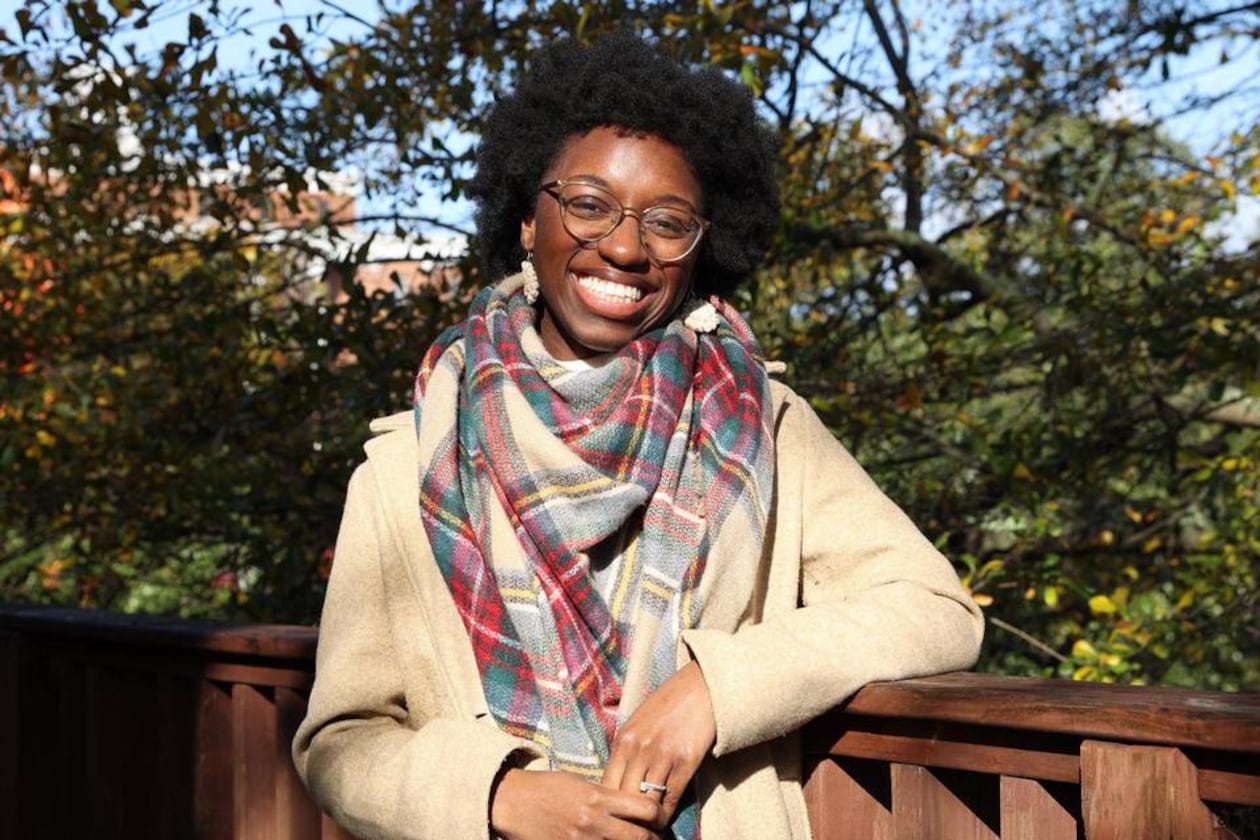 Judah David Creations owner Darice Oppong poses on the back porch of The Web on Wednesday, Dec. 11, 2024, in Macon, Georgia. Oppong started her crochet small business Judah David Creations in January 2024 after learning to crochet after the loss of her son. (Photo Courtesy of Katie Tucker/The Telegraph)