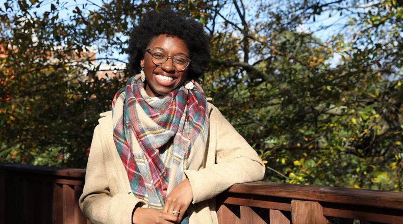 Judah David Creations owner Darice Oppong poses on the back porch of The Web on Wednesday, Dec. 11, 2024, in Macon, Georgia. Oppong started her crochet small business Judah David Creations in January 2024 after learning to crochet after the loss of her son. (Photo Courtesy of Katie Tucker/The Telegraph)
