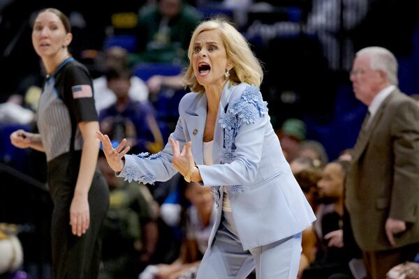 LSU head coach Kim Mulkey reacts during the first half in the first round of the NCAA college basketball tournament against San Diego State, Saturday, March 22, 2025, in Baton Rouge, La. (AP Photo/Matthew Hinton)
