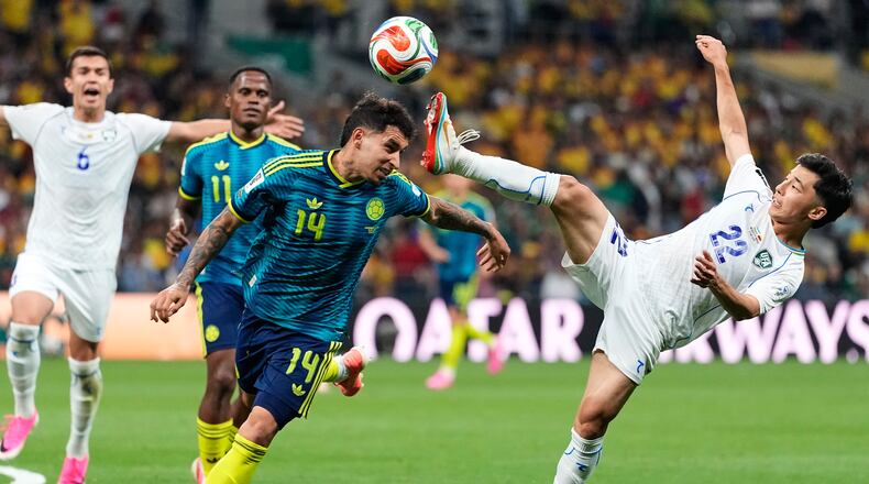 Uzbekistan's Abbosbek Fayzullaev (right) and Colombia's Gustavo Puerta compete for the ball during the World Cup Group K soccer match between Uzbekistan and Colombia in Mexico City, Wednesday, June 17, 2026. (Natacha Pisarenko/AP)