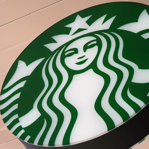 FILE - This is a sign in front of a Starbucks in Dormont, Pa., March 18, 2025. (AP Photo/Gene J. Puskar, File)