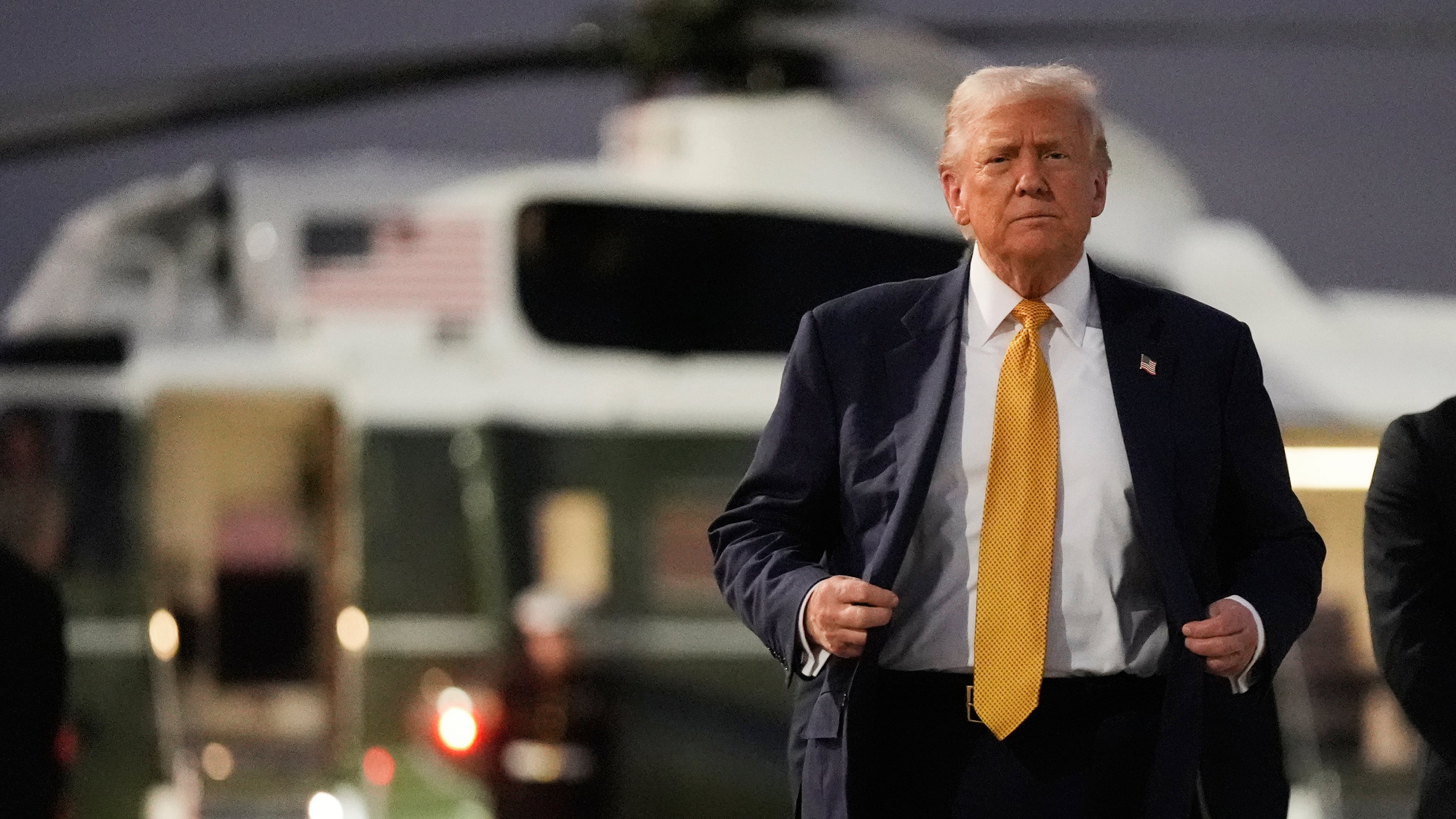 President Donald Trump arrives at Haneda Airport before switching his ride to Marine One in Tokyo, Japan, Monday, Oct. 27, 2025, following his visit at the ASEAN summit in Malaysia. (AP Photo/Mark Schiefelbein)