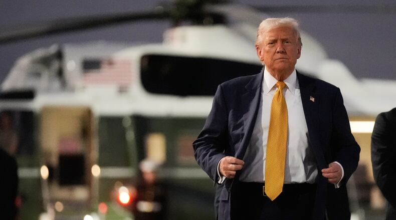 President Donald Trump arrives at Haneda Airport before switching his ride to Marine One in Tokyo, Japan, Monday, Oct. 27, 2025, following his visit at the ASEAN summit in Malaysia. (AP Photo/Mark Schiefelbein)