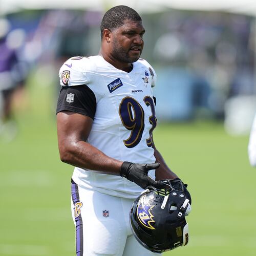 Baltimore Ravens defensive end Calais Campbell (93) watches during the team's NFL football training camp, Tuesday, Aug. 11, 2026, at the Under Armour Performance Center in Owings Mills, Md. (AP Photo/Stephanie Scarbrough)