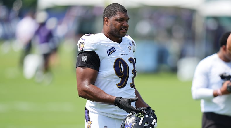 Baltimore Ravens defensive end Calais Campbell (93) watches during the team's NFL football training camp, Tuesday, Aug. 11, 2026, at the Under Armour Performance Center in Owings Mills, Md. (AP Photo/Stephanie Scarbrough)