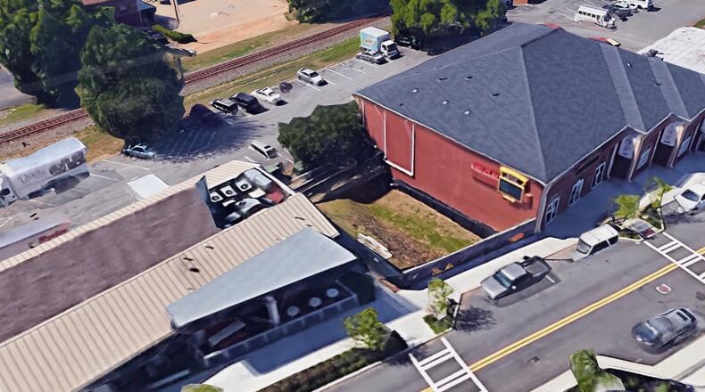 Duluth’s ‘the hole’ will be transformed into a two-story turn of the century-style building with street-level retail and corporate space on the second floor. Google Maps