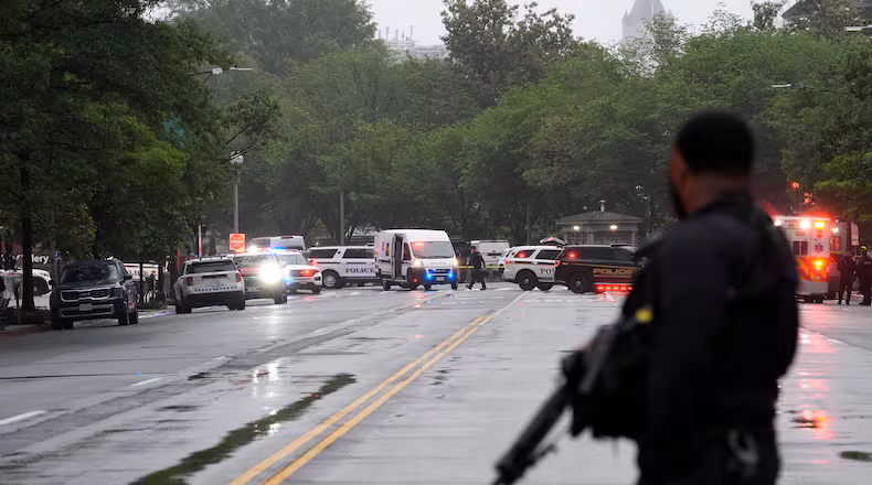 Police and members of the Secret Service block streets around the White House, Saturday, May 23, 2026, in Washington. (AP Photo/Alex Brandon)
