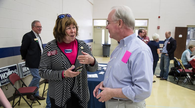 State Rep. Betty Price talks with her husband, former U.S. Rep. Tom Price, during the 6th Congressional District BBQ Roundup in Roswell. STEVE SCHAEFER / AJC FILE PHOTO