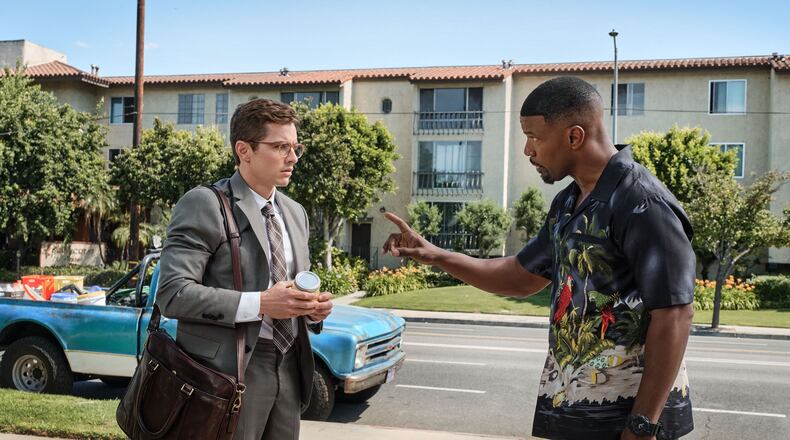 Dave Franco, left, and Jamie Foxx in "Day Shift." (Parrish Lewis/Netflix/TNS)