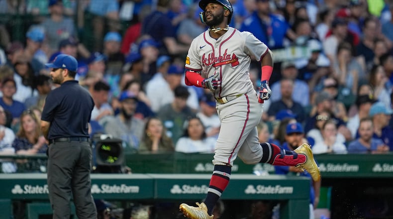 Atlanta Braves' Michael Harris II runs the bases after hitting a home run against the Chicago Cubs during the fourth inning of a baseball game Tuesday, May 21, 2024, in Chicago. (AP Photo/Erin Hooley)