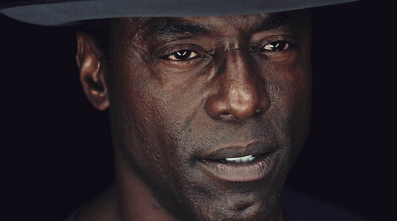 SAN DIEGO, CA - JULY 26: In this handout photo provided by Warner Bros, Isaiah Washington of "The 100" attends Comic-Con International 2014 on July 26, 2014 in San Diego, California. (Photo by Smallz+Raskind/Warner Bros. Entertainment Inc. via Getty Images)