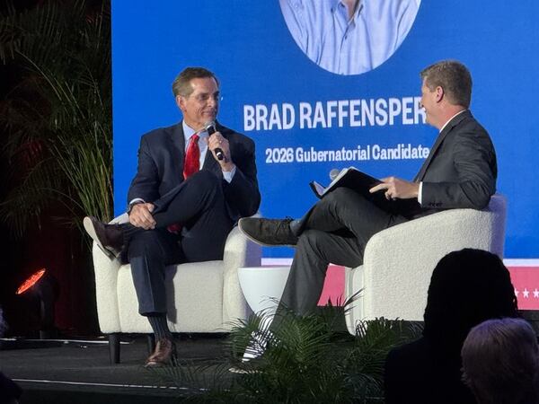 Secretary of State Brad Raffensperger (left) spoke to the AJC's Greg Bluestein about his candidacy for governor during a recent Politically Georgia forum in Atlanta. (Adam Beam/AJC)