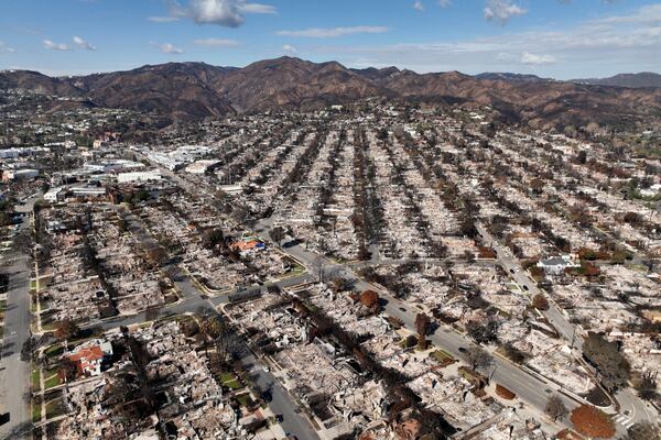 FILE - The devastation from the Palisades Fire is shown in an aerial view in the Pacific Palisades neighborhood of Los Angeles, Monday, Jan. 27, 2025. (AP Photo/Jae C. Hong, File)