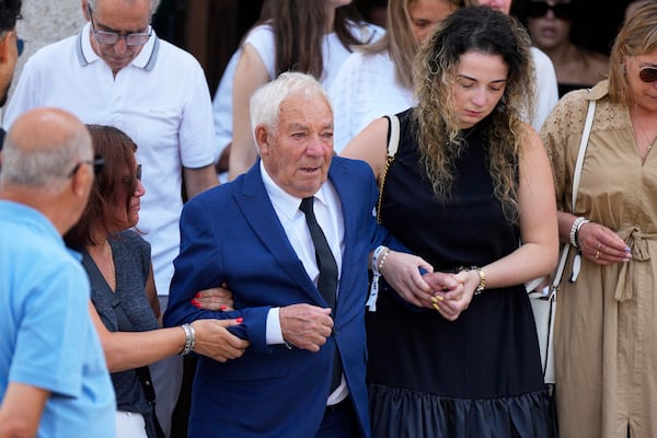 Joaquim Silva, grandfather of Diogo Jota and André Silva, follow their coffins during their funeral in Gondomar, near Porto, Portugal, on Saturday, July 5, 2025. (AP Photo/Manu Fernandez)