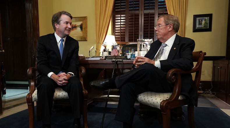 U.S. Sen. Johnny Isakson, R-Ga., right, meets with Supreme Court nominee Judge Brett Kavanaugh in his office on Capitol Hill on July 17, 2018 .  (Photo by Alex Wong/Getty Images)