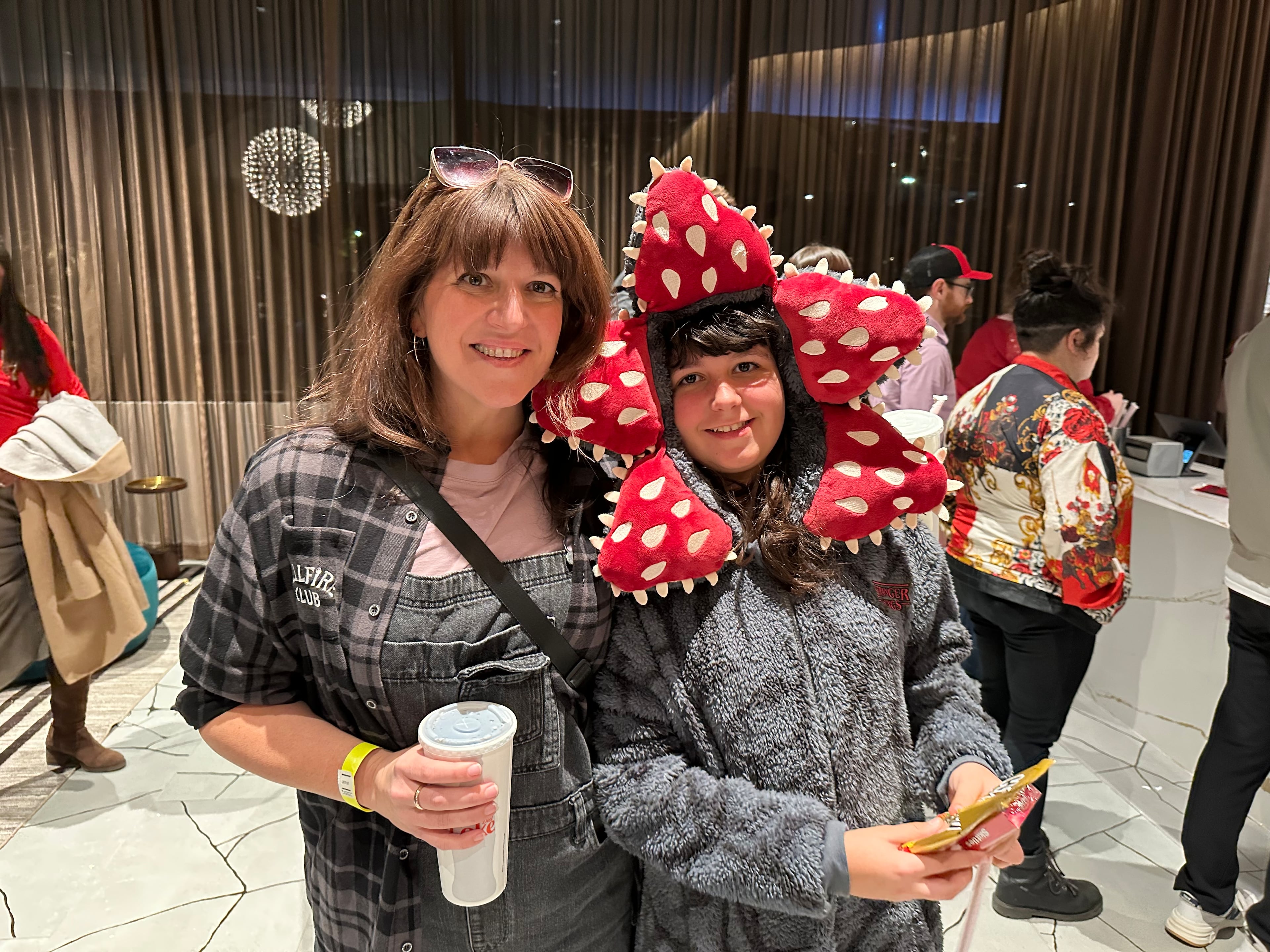 Devin Morales, who worked in makeup for "Stranger Things" Seasons 4 and 5, brought daughter Ayla to the SCAD screening of the final season. (Rodney Ho/AJC)
