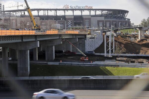 Cobb Commission Chairman Mike Boyce has invited the Braves to a public discussion on Tuesday to resolve the funding disagreement over transportation projects around the new stadium. BOB ANDRES /BANDRES@AJC.COM