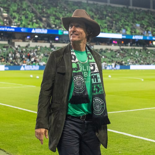 Actor Matthew McConaughey acknowledges the fans as he walks a sideline before Game 2 in the first round of MLS soccer's Western Conference playoffs between Los Angeles FC and Austin FC, Sunday, Nov. 2, 2025, in Austin, Texas. (AP Photo/Stephen Spillman)